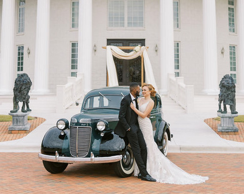 Griffeth and Sarah Whitehurst embrace on the mezzanine of Whitehurst Gallery.
