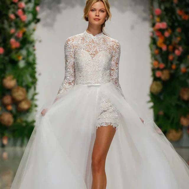 Bridal model walking down runway wearing latest bridal l style